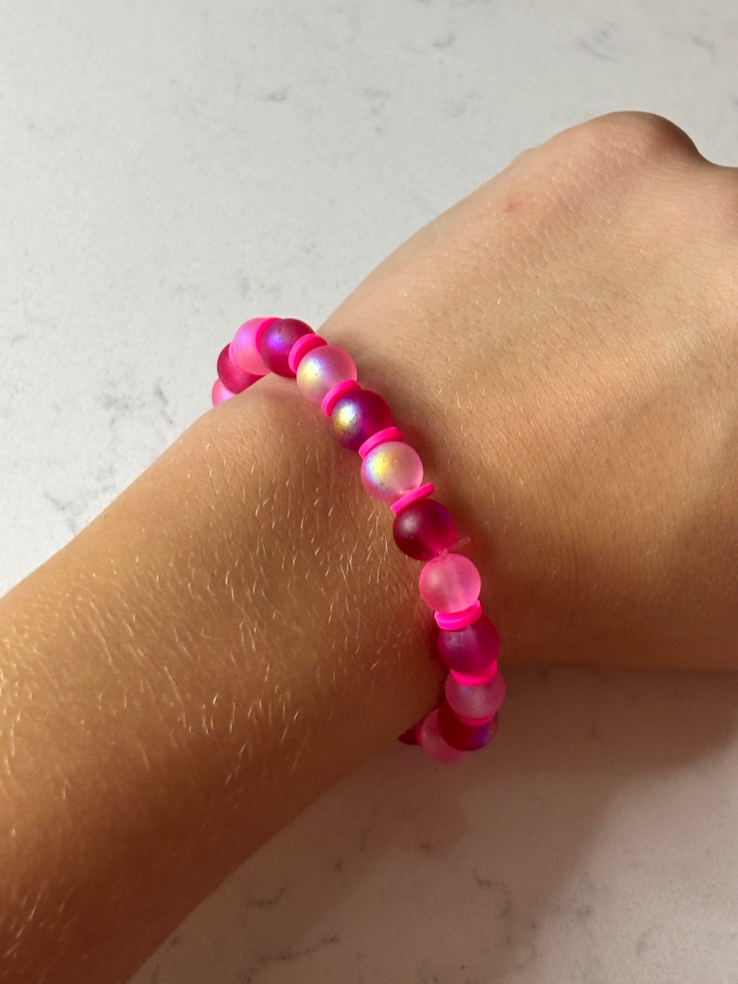 Pink , pink , and more pink glass beaded bracelet